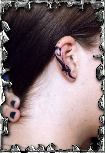 60k: ehind the ear tattoo