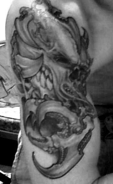 Ed Lee Biomech Skull tattoo One of