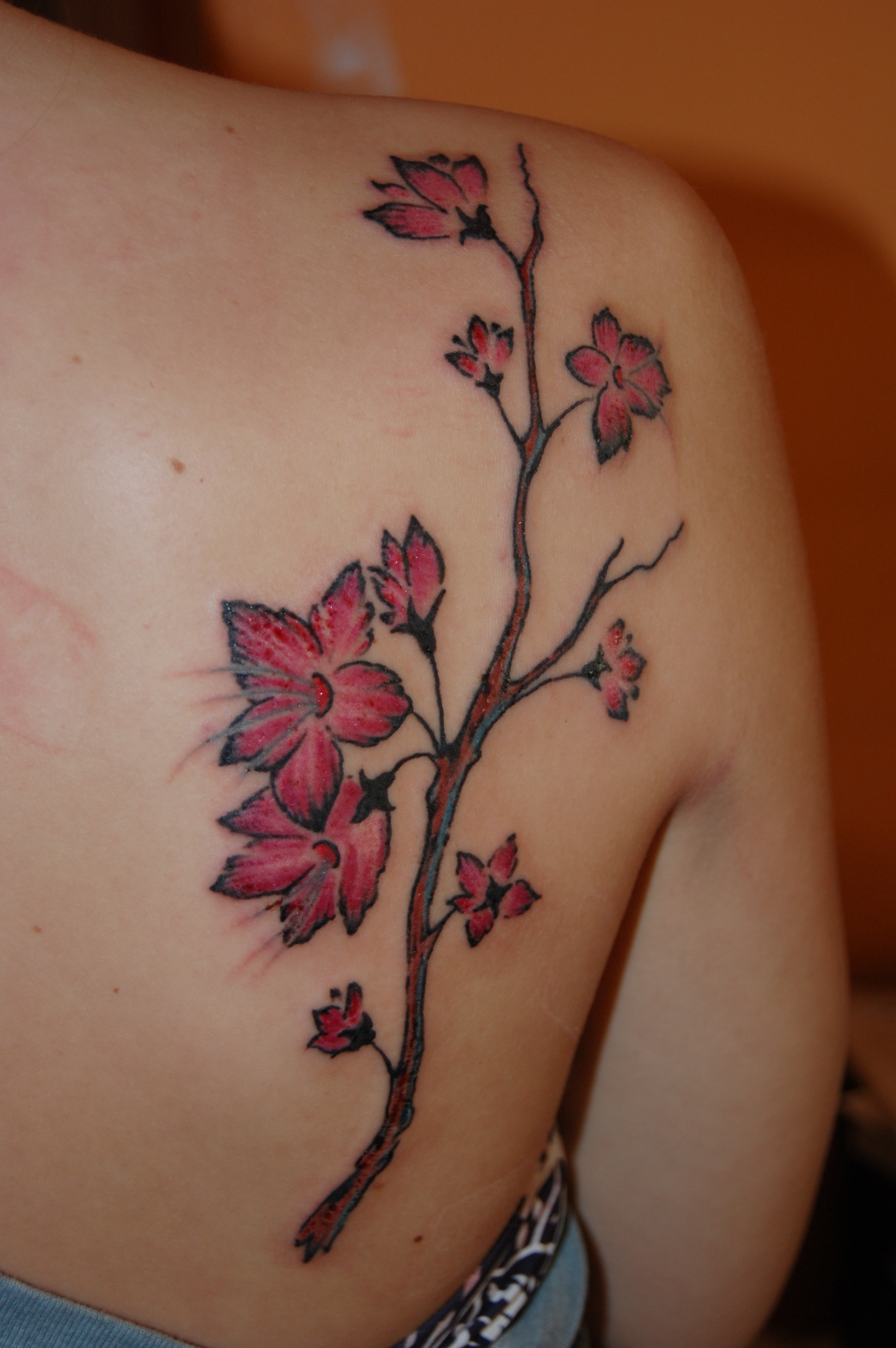 blossom tattoo art on back body