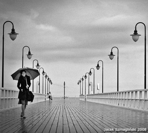 woman with umbrella by JSzmaglinski